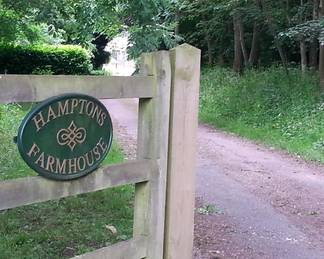 The gate and sign at Hamptons Farmhouse